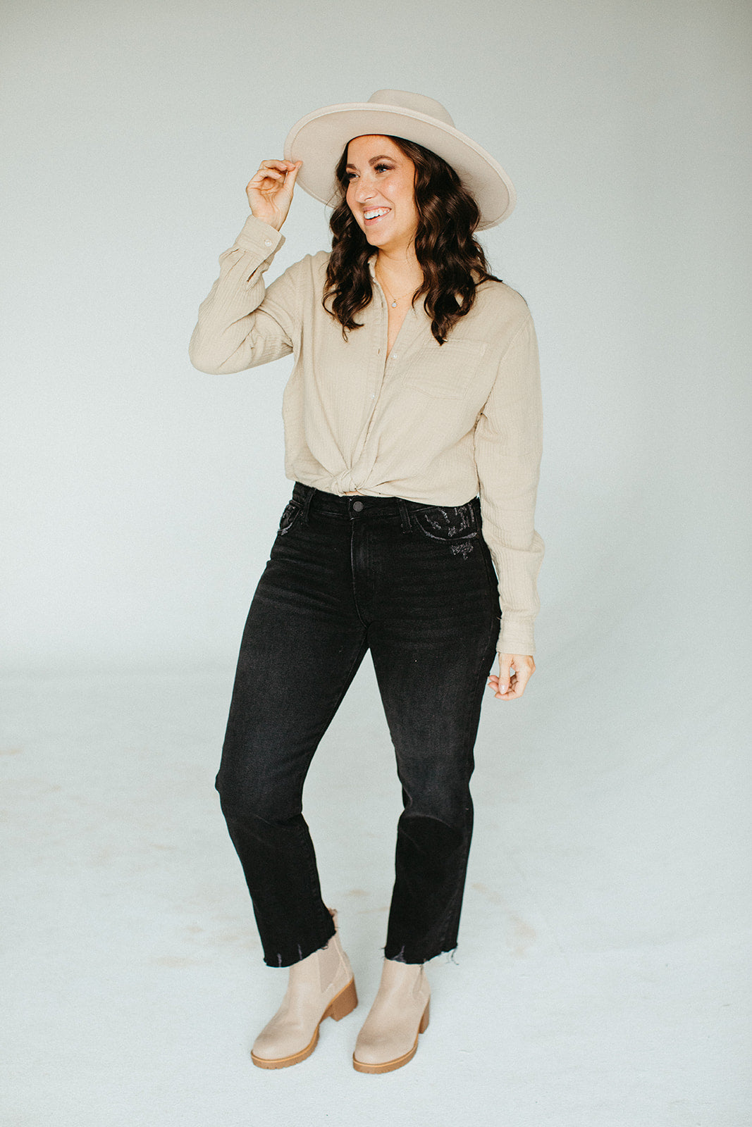 black_mid_rise_slim_straight_distressed_jean