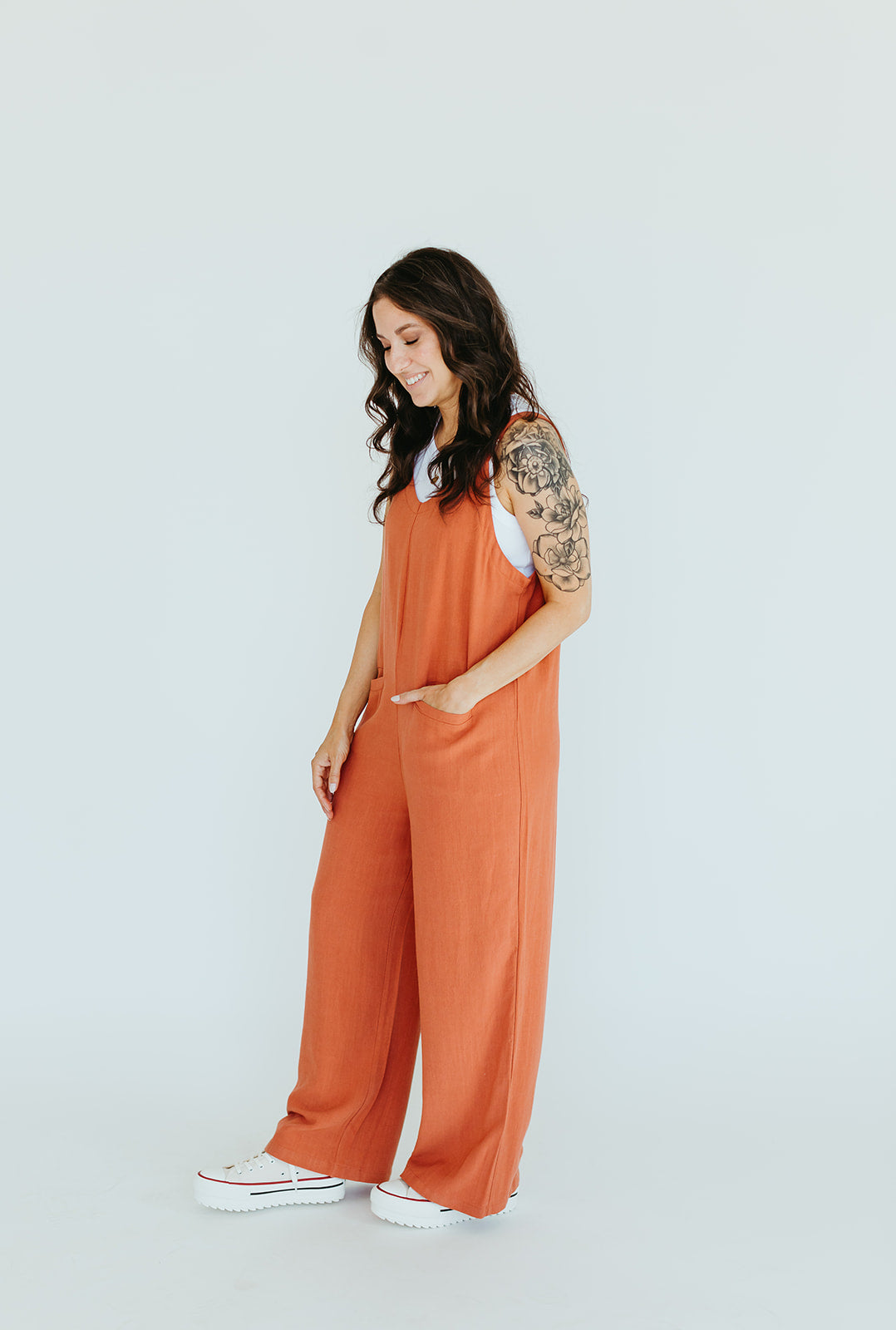 linen_oversized_pocket_jumpsuit_adjustable_straps_wide_leg