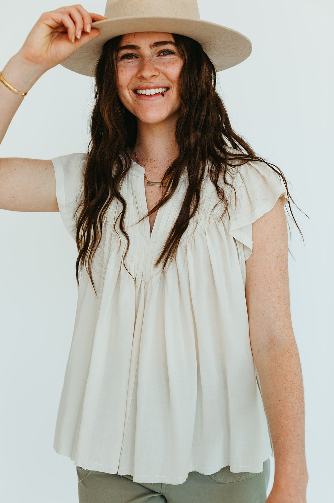 off_white_flutter_sleeve_pleated_v_neck_babydoll_top